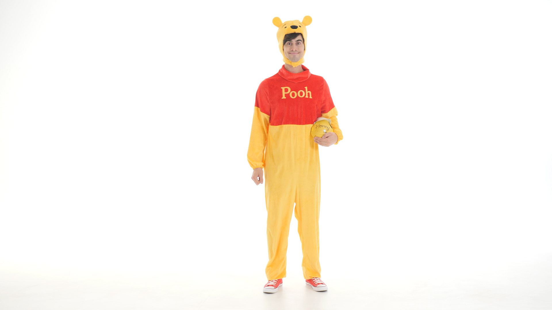 Get your honey and hum all the way to your Halloween party in this Winnie the Pooh Deluxe Adult Costume.